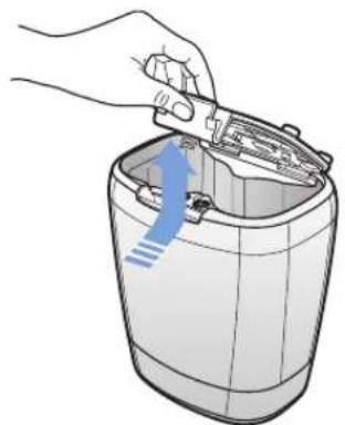 Illustration of a hand using a tool to lift or adjust a cylindrical container (no text or symbols visible)