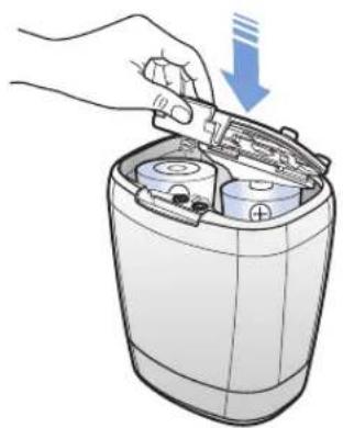 Illustration of a hand inserting a battery into a cylindrical container with liquid, showing a downward arrow (no text or symbols)