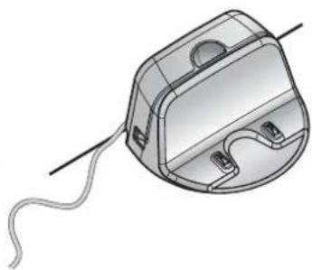 Technical illustration of a mechanical device with a coiled cable and mounting holes (no text or symbols)
