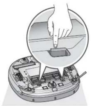 Illustration of a hand pressing down on a device component (no text or symbols visible)