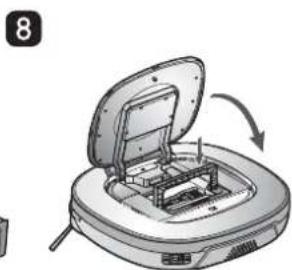 Diagram of a device with an open lid and internal components, showing a curved arrow indicating rotation (no text or symbols present)