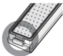 Cross-sectional illustration of a mechanical component with perforated surfaces and layered structure (no text or symbols)