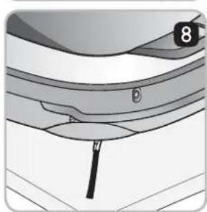 Close-up of a mechanical component with layered structure and a black arrow pointing to a feature (no text or symbols visible).