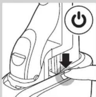Diagram showing a hand pressing a button on a device with a power symbol, indicating action or operation.