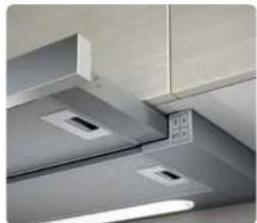Close-up of ceiling-mounted air ducts and ventilation grilles (no text or symbols visible)