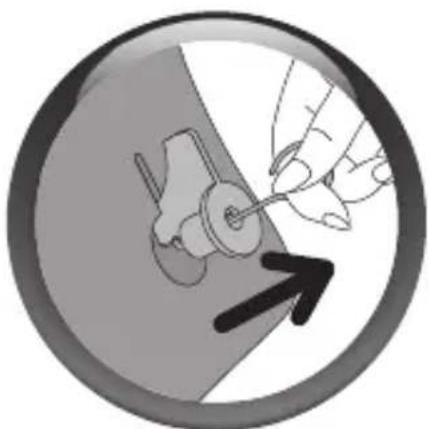 Diagram showing a hand holding a tool inside a circular frame, with an arrow pointing to a mechanical component (no text or symbols present)