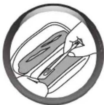 Illustration of a hand holding a tool over a curved object inside a circular frame (no text or symbols)