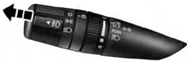 Close-up of a black handheld device with control buttons labeled 'E', 'D', and 'PUSH' pointing to left and right buttons respectively.