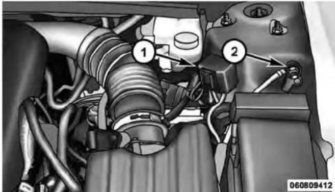 Technical diagram of an automotive engine showing labeled components with numbered annotations