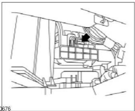 Technical line drawing of a mechanical assembly with a black arrow pointing to a component (no text or symbols present)