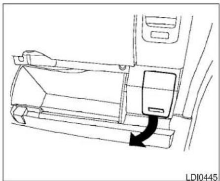 Line drawing of a car interior showing a seatbelt and directional arrow (no text or symbols)