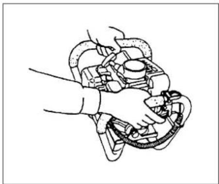 Line drawing of hands holding a mechanical component (no text or symbols)