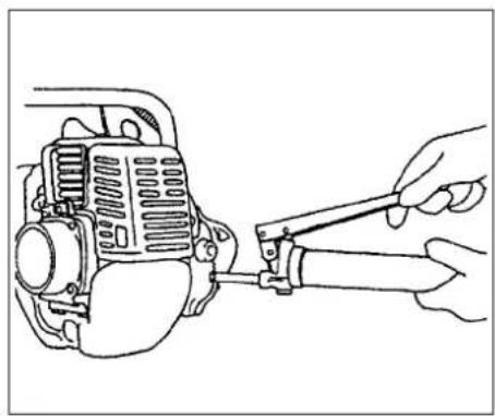 Line drawing of a hand using a tool to adjust or install a mechanical component (no text or symbols present)