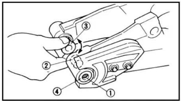 Technical diagram showing a mechanical assembly with numbered components, likely illustrating a turning or disassembly process.