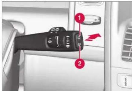 Diagram showing a camera control interface with labeled parts and directional arrow indicating motion