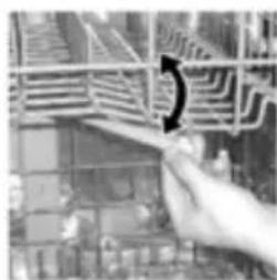 Close-up of a hand interacting with a grid-patterned circuit board (no visible text or symbols)