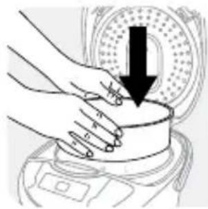 Illustration of hands pressing down on a cylindrical object with a downward arrow (no text or symbols)
