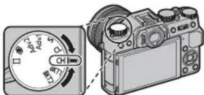 Diagram showing a camera dial and its rotary switch, with Chinese labels for dial settings.