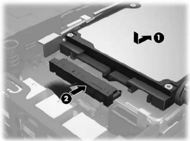 Close-up of a mechanical assembly with labeled components (1 and 2), no readable text or symbols beyond labels