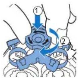 Diagram showing a blue mechanical device with labeled parts and directional arrows indicating motion or assembly.