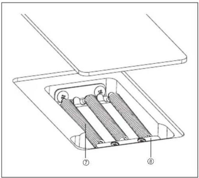 Technical diagram of a mechanical device with labeled components, showing internal gears and housing structure.