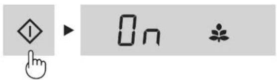 Diagram showing a hand cursor clicking a diamond icon next to an 'On' button and a leaf symbol, likely representing a navigation or control interface.