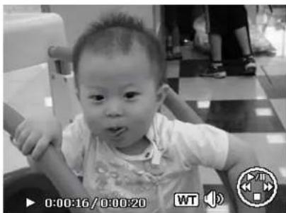 Black-and-white photo of a baby sitting in a chair, no visible text or symbols