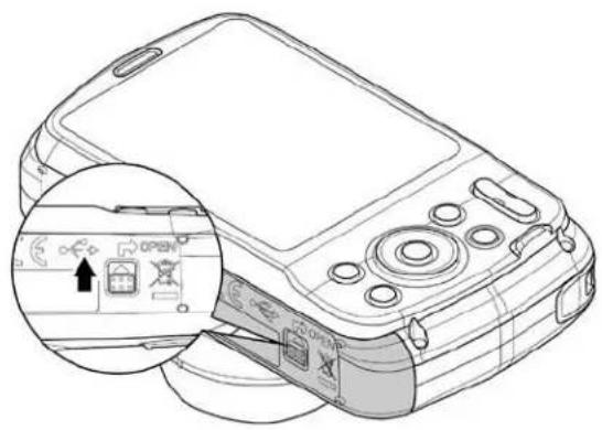 Line drawing of a digital camera module with an inset close-up showing the camera's screen and control buttons (no text or symbols present)