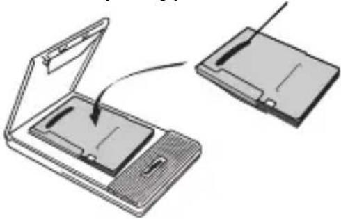 Diagram showing a laptop with an open lid and a separate flat-screen device, no text or symbols present.
