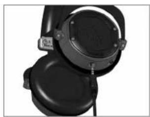 Close-up of black headphones with a circular headrest and attached microphone (no visible text or symbols)