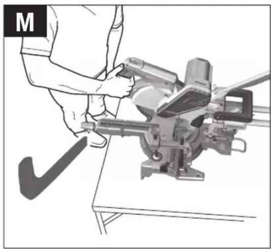 Person using a cutting machine on a workbench, no visible text or symbols