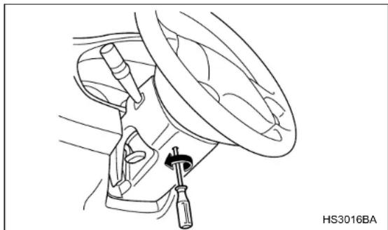 Line drawing of a car wheel assembly with a tool inserted, no text or symbols present