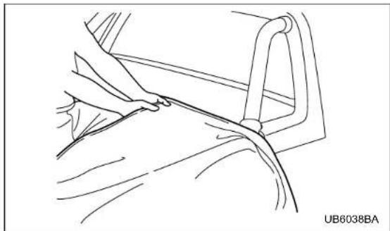 Line drawing of a medical procedure with surgical tools and tubing (no text or symbols)