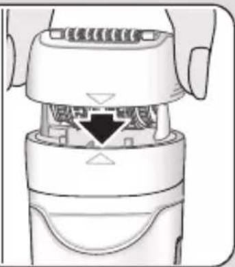 Diagram of a device's internal structure showing a connector with a downward arrow indicating compression (no text or symbols present)