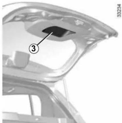 Gros plan du coffre d'une voiture avec une annotation numérotée pointant vers le panneau intérieur (aucun texte ou symbole visible)