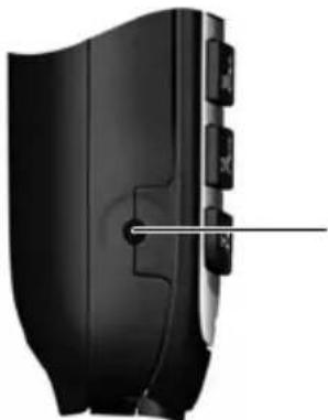 Close-up of a black electronic device with four buttons and a pointer line pointing to a button (no visible text or symbols)