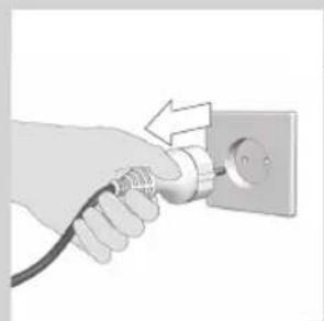 Hand inserting a plug into an electrical outlet (no text or symbols visible)