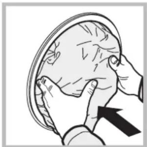 Illustration of hands performing a medical or anatomical task on a human head, with an arrow indicating direction (no text or symbols present)