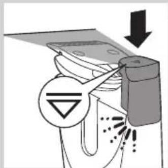 Diagram illustrating a process with warning symbols and directional arrows, showing a device emitting particles or dust.
