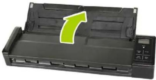 Black printer with green arrow indicating a 7x increase in size (no text or symbols on the device itself)