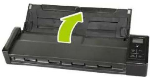 Black printer with green arrow indicating a 7x increase in size (no text or symbols on the device itself)