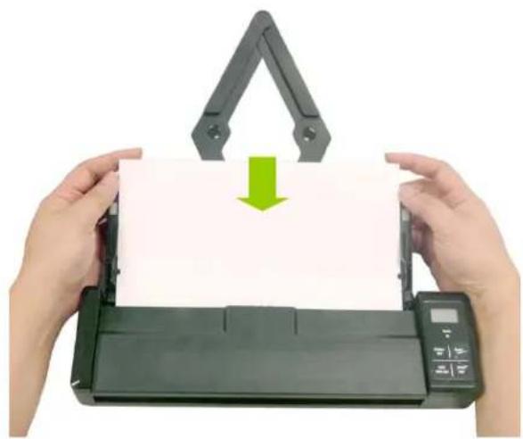 Two hands holding a printer with a green downward arrow indicating compression or disassembly (no text or symbols visible)