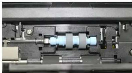 Close-up mechanical assembly showing internal components and shafts (no visible text or symbols)