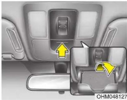 Interior view of a car showing the backrest door and side panel, with an inset highlighting the seat area (no text or symbols visible)