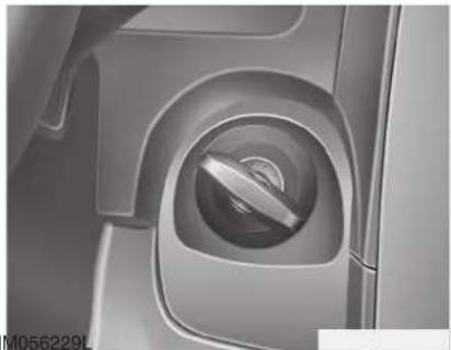 Close-up of a car's side panel showing the vent and handle (no text or symbols visible)