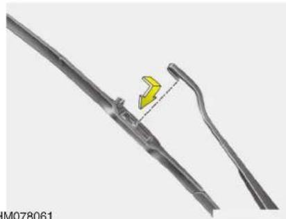 Technical illustration of a mechanical component with a yellow arrow indicating a specific feature (no text or symbols present)