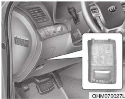 Interior view of a car dashboard and steering wheel (no visible text or symbols)