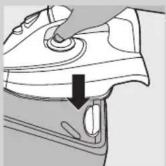 Line drawing of a hand pressing down on a car wheel (no text or symbols)
