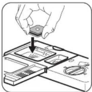 Diagram showing a hand holding a small electronic component with a 20-degree angle annotation and a circular dial indicator.