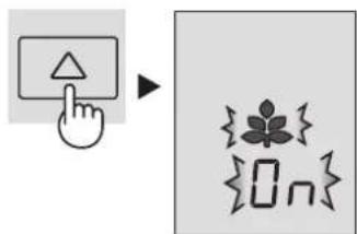 Diagram showing a hand pressing a button next to a window with icons and symbols, likely illustrating UI control or navigation.